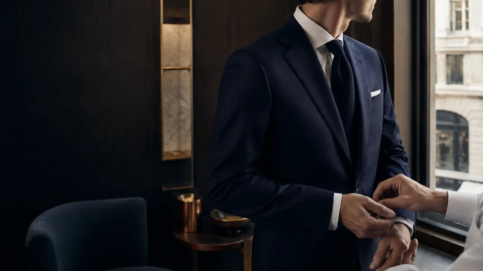 Editorial photograph for the guide: The Wedding Suit Timeline: When to Order, Fitting to Wedding Day